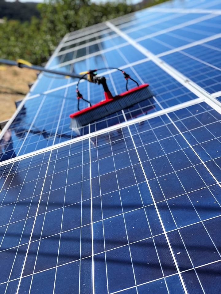Cleaning residential solar panel array